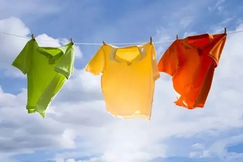 What are the hazards of sun exposure to fabrics?